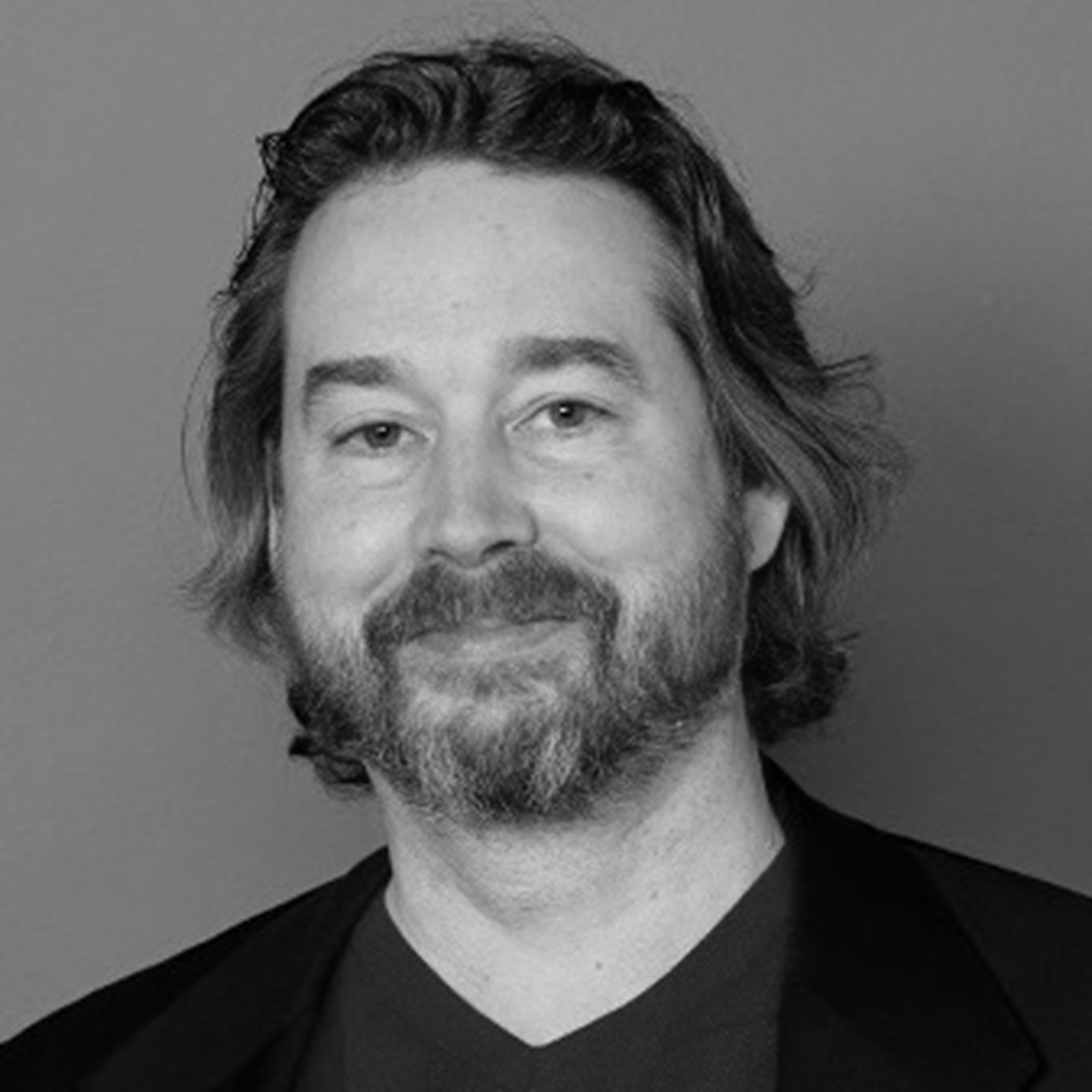 A person with a beard and mustache.